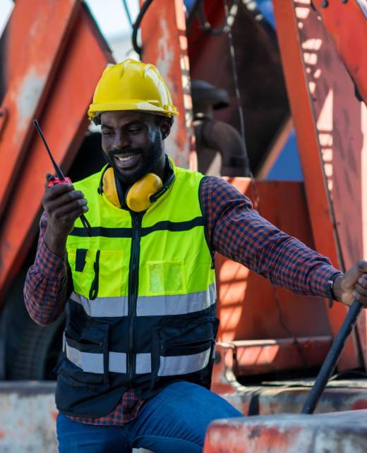 foreman-holding-walkie-talkie-for-control-working-2023-11-27-05-20-48-utc